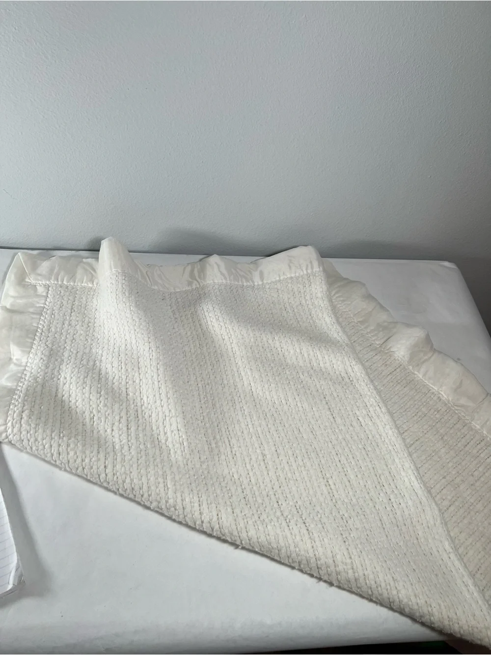 Cream Textured Knit Throw with satin trim 36x44